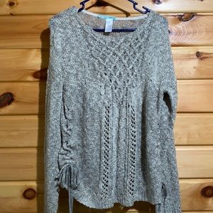 Gray knit sweater with string cinched sides